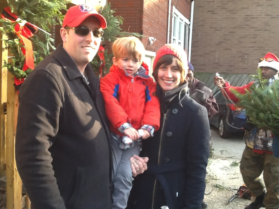 family buying a christmas tree