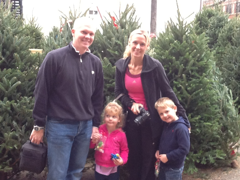 family buying a christmas tree