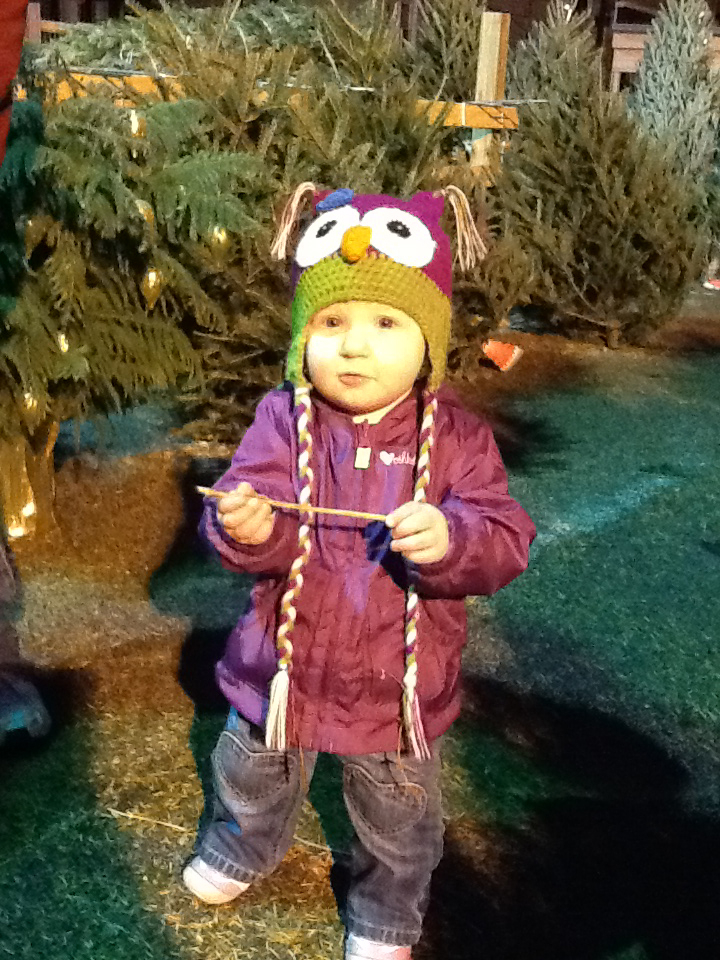 baby at the christmas tree lot